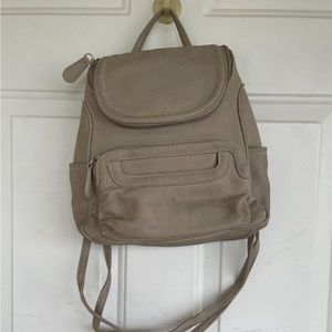 MultiSac handbag/backpack in tan PU leather,10”X12” with 8 pockets